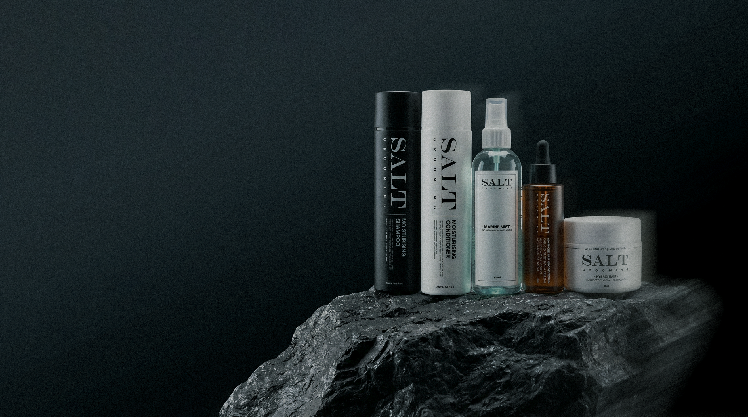 Man using sea salt spray for hair